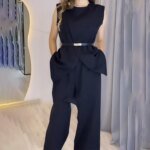 ⁦طقم بنطال نسائي برقبة مستديرة بدون أكمام علوي وخصر عالٍ ، بنطال طويل بساق واسعة ، أبيض ، أحادي اللون ، مقاس ضيق ، مجموعتان⁩ - الصورة ⁦6⁩
